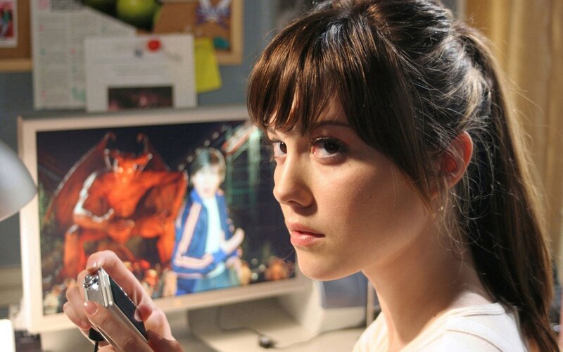 Girl watching video on camera