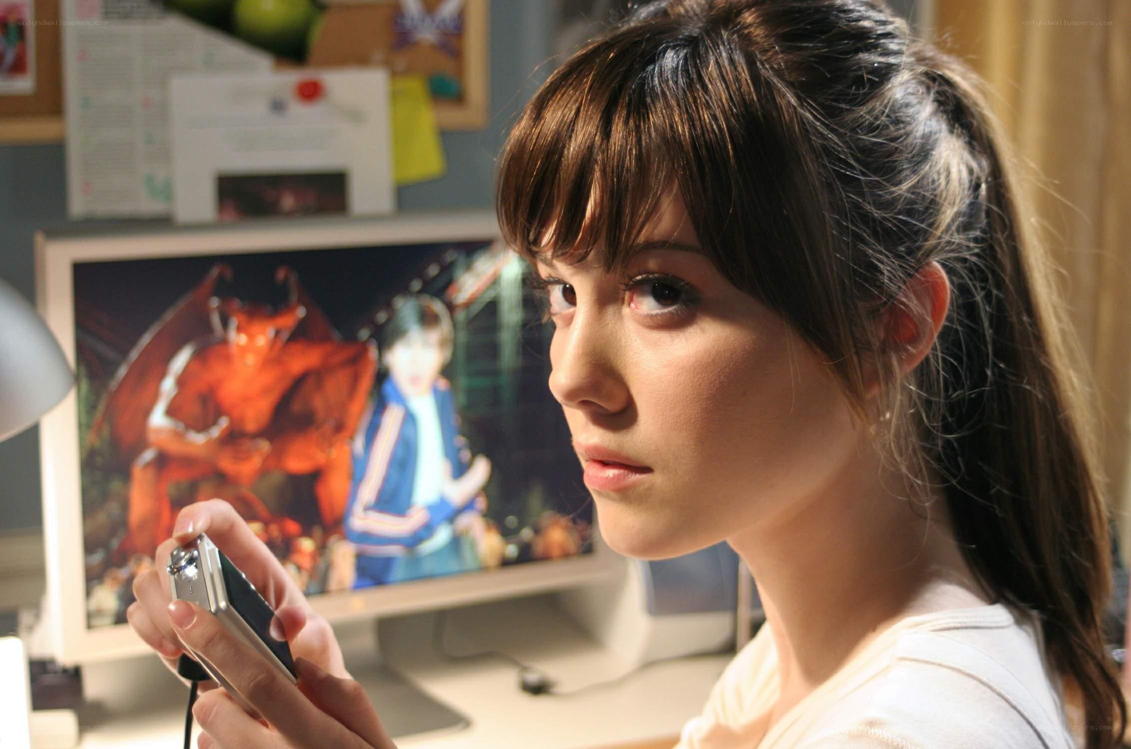 girl watching video on camera