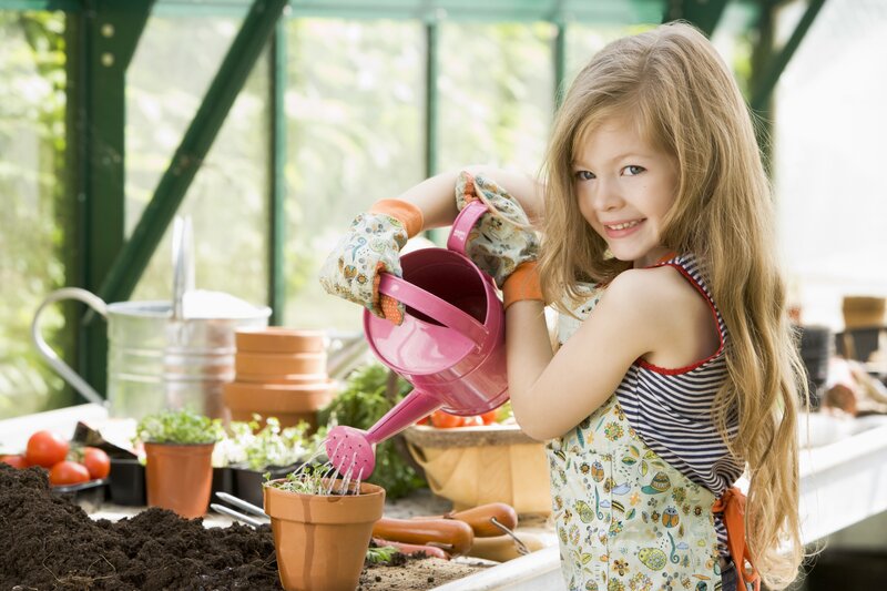Girl Watering Plants — Pink