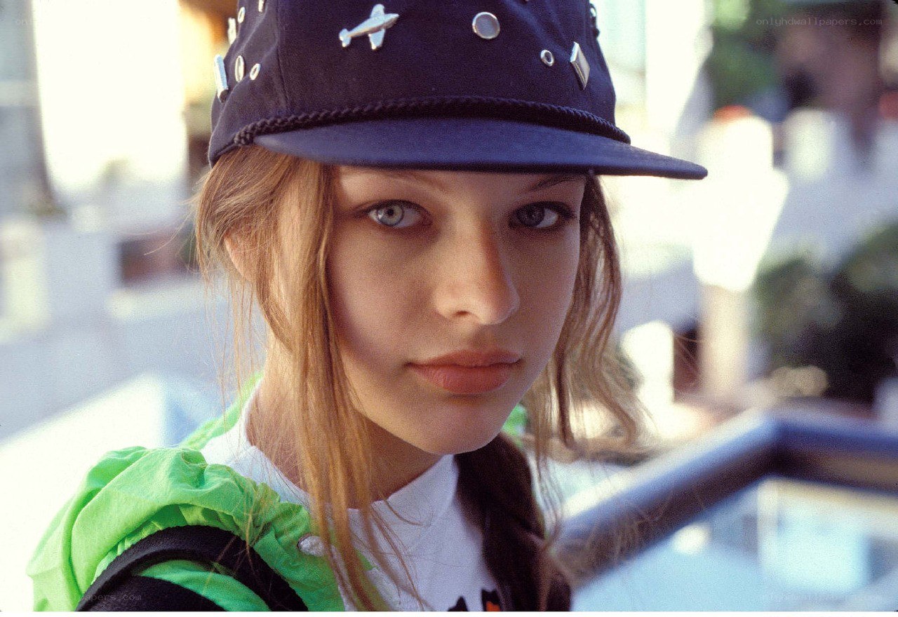 girl wearing a cap