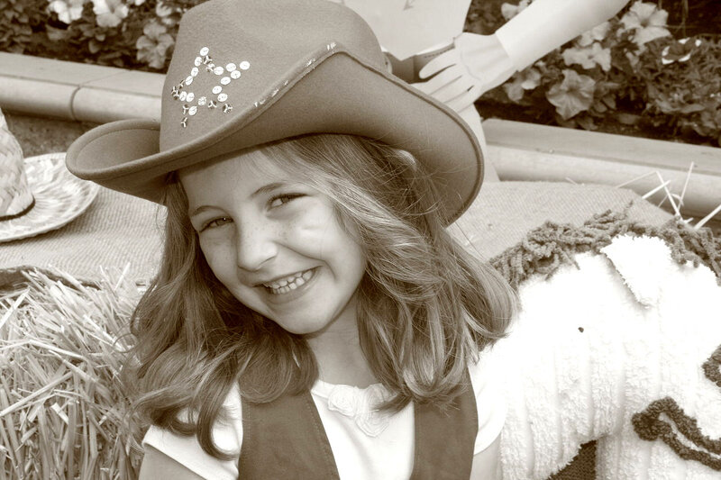 Girl Wearing Cowboy Hat — Brown