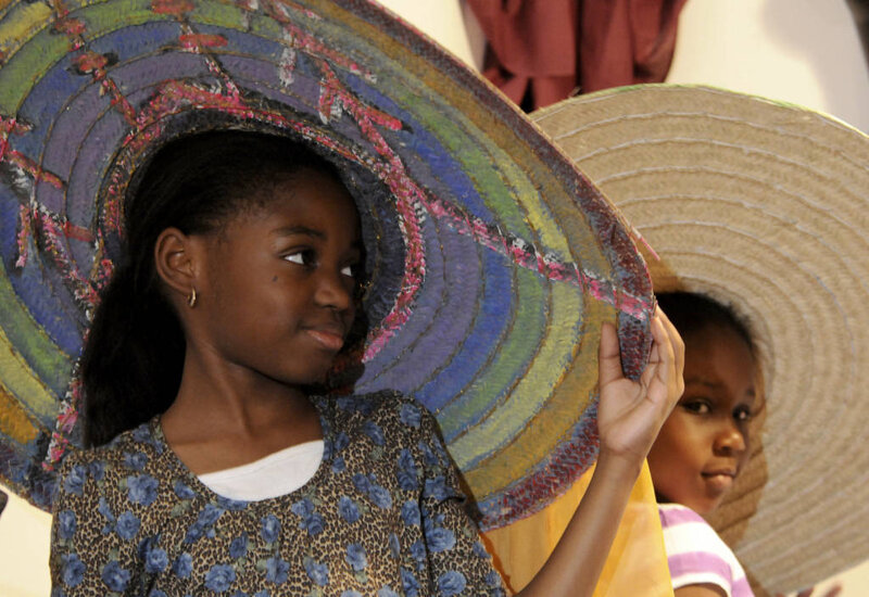 Girl Wearing Large Hat