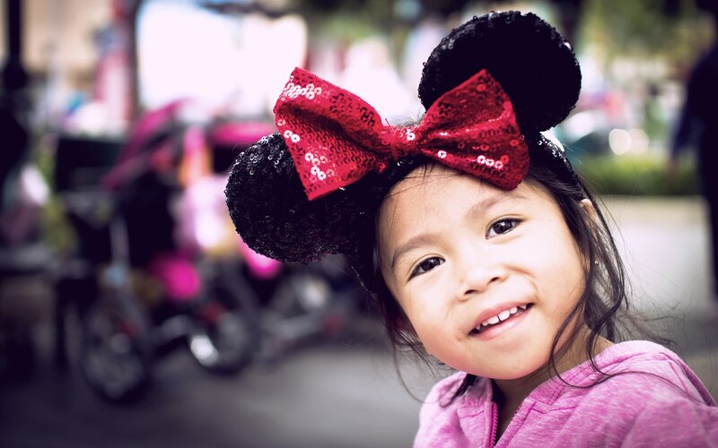 girl wearing minnie mouse ears