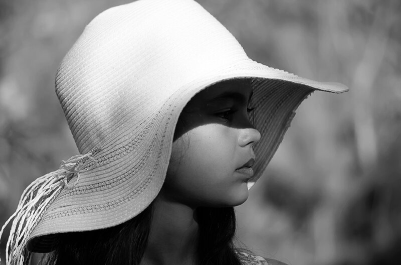 Girl Wearing Straw Hat