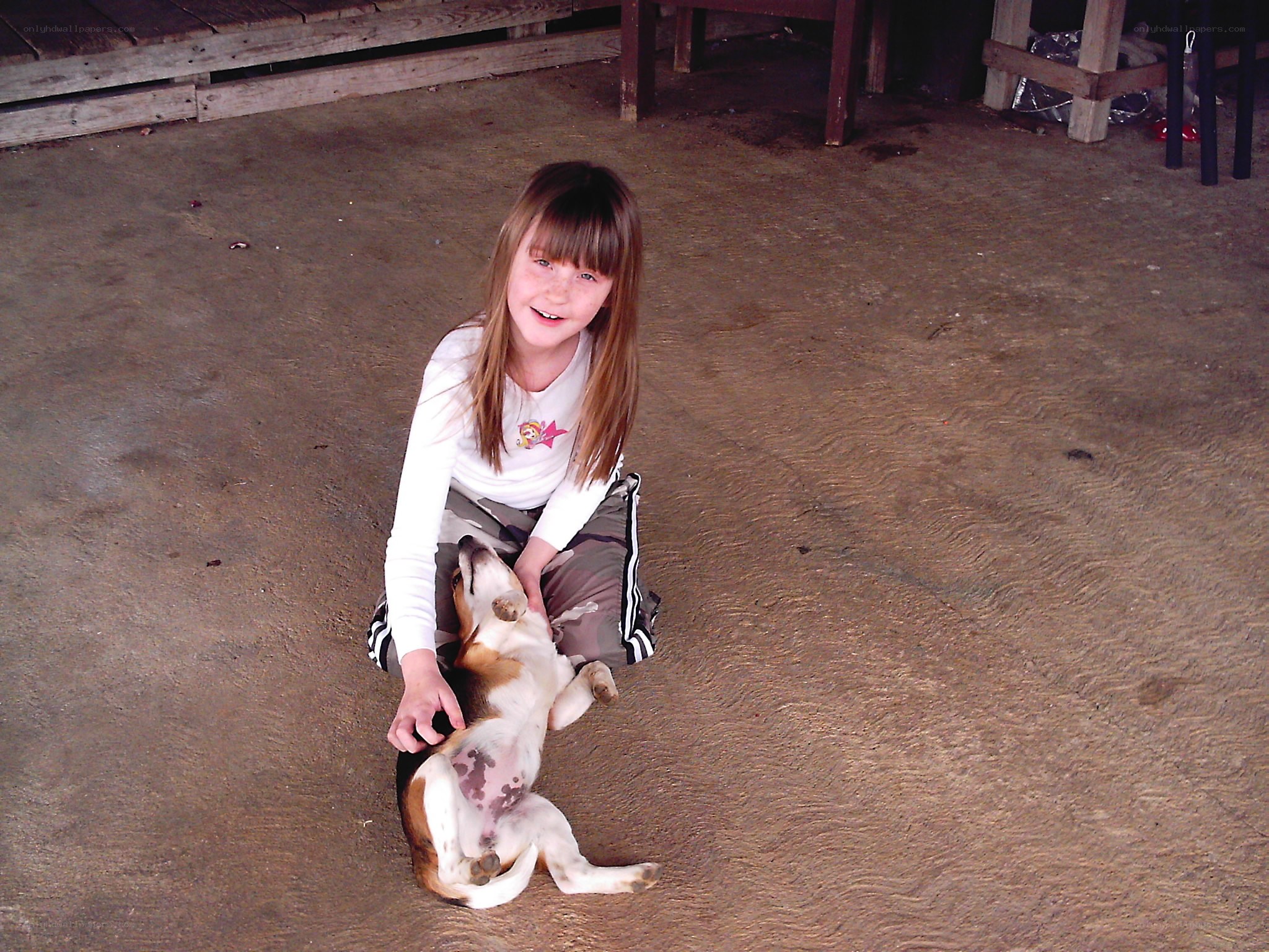 Girl with a beagle dog