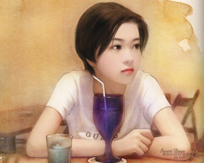 Girl with a drink at a cafe