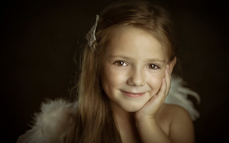 Girl with Angel Wings — Brown, Serene