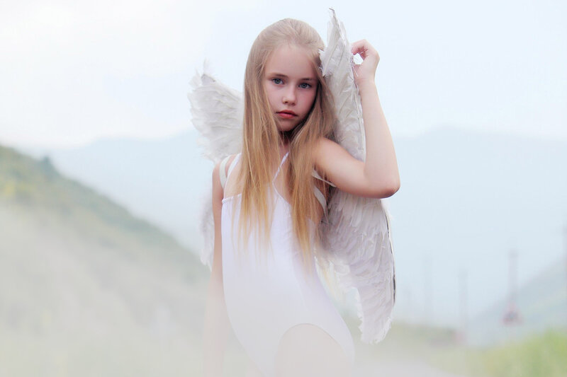Girl with Angel Wings — White, Serene, Photograph, Mountains