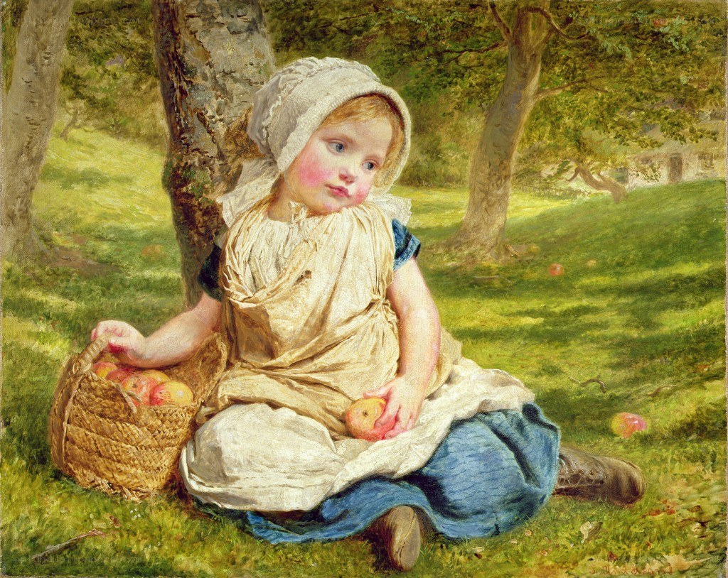 Girl with apples in garden