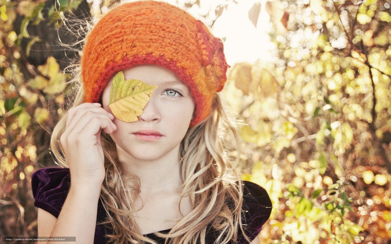 girl with autumn leaf