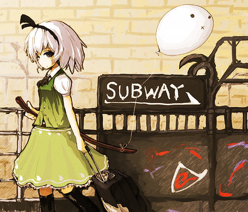 Girl with balloon at subway
