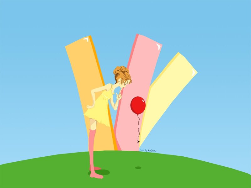 Girl with balloon on hill