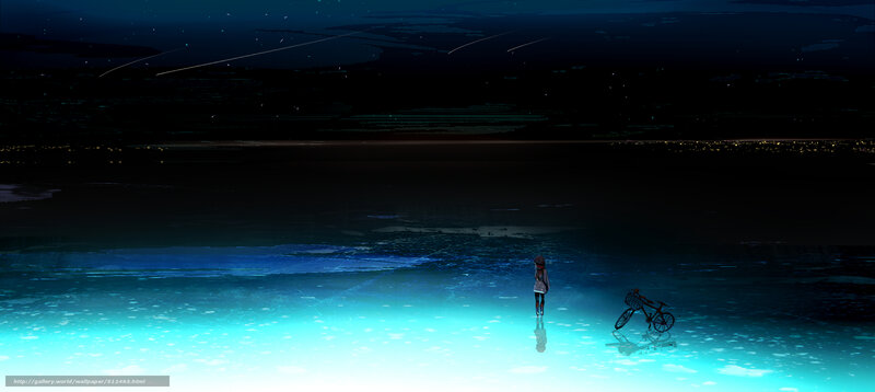 Girl with bicycle at night