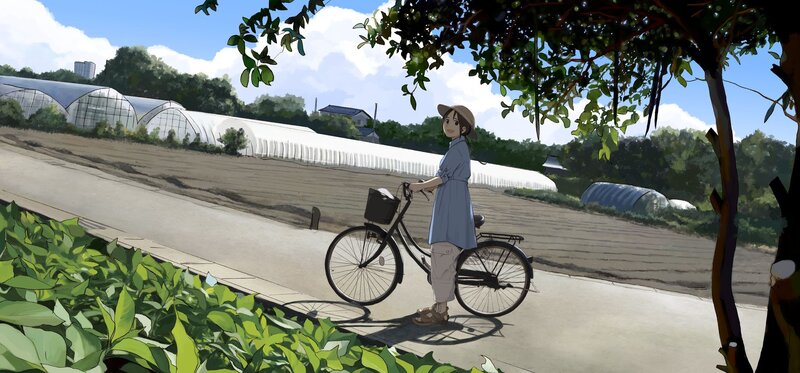 Girl with bicycle in rural area