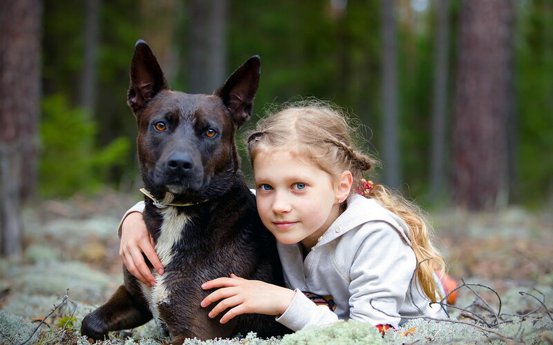 Girl with Black Dog