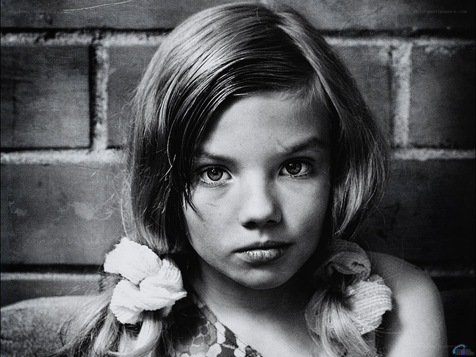 girl with braided pigtails