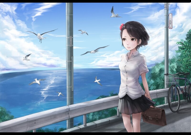 Girl with briefcase by the sea