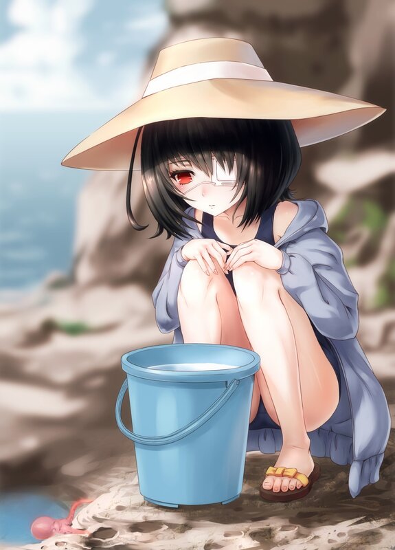 girl with bucket at beach