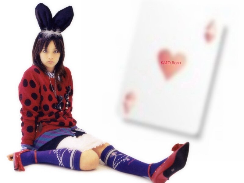 girl with bunny ears and card