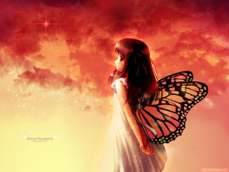 Girl with butterfly wings at sunset