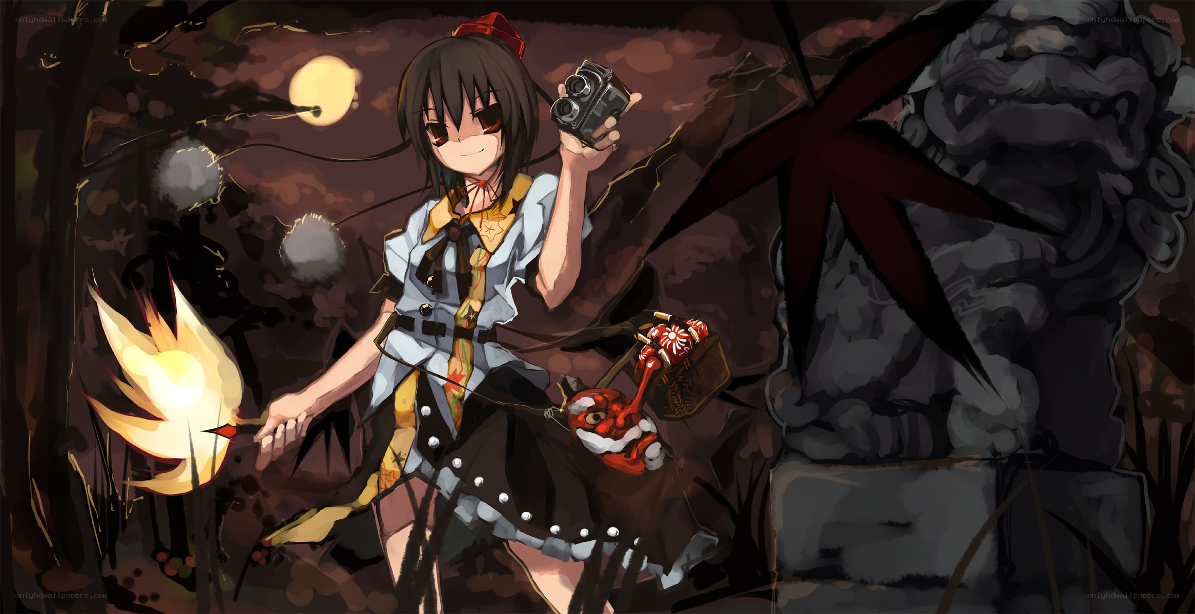 Girl with camera in dark forest