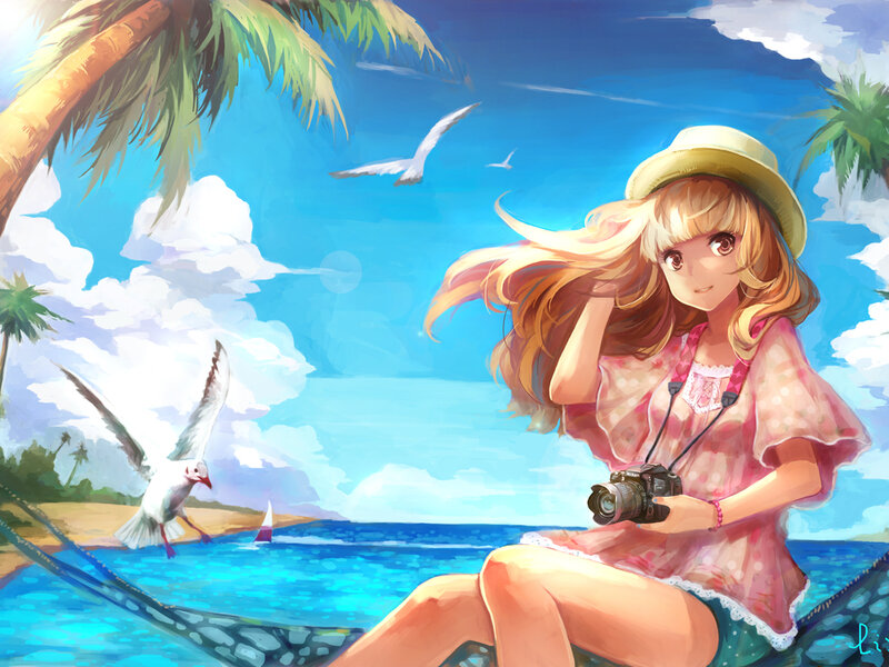 Girl with Camera on Beach
