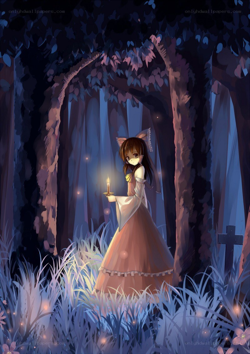 girl with candle in forest