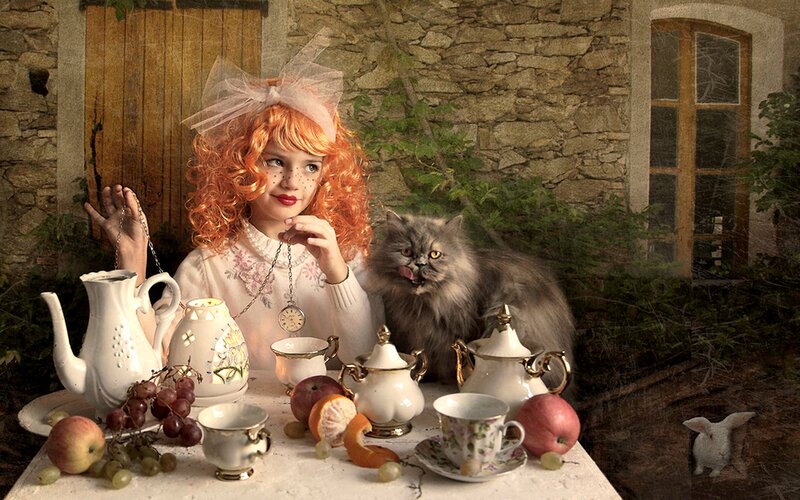 Girl with Cat at Tea Table
