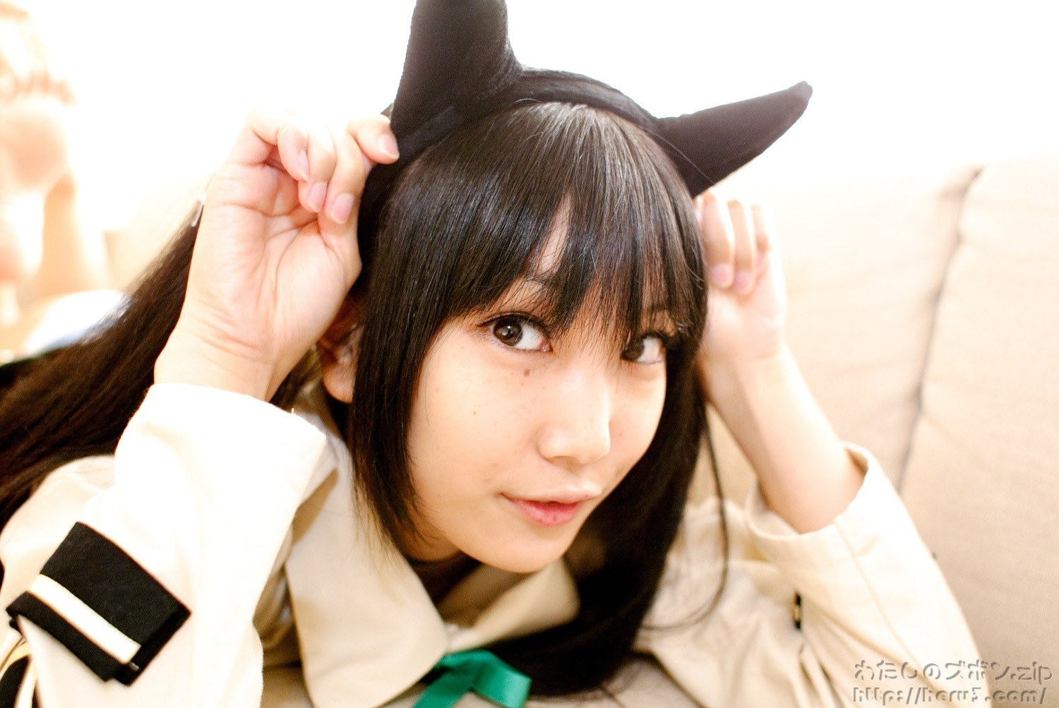girl with cat ears cosplaying