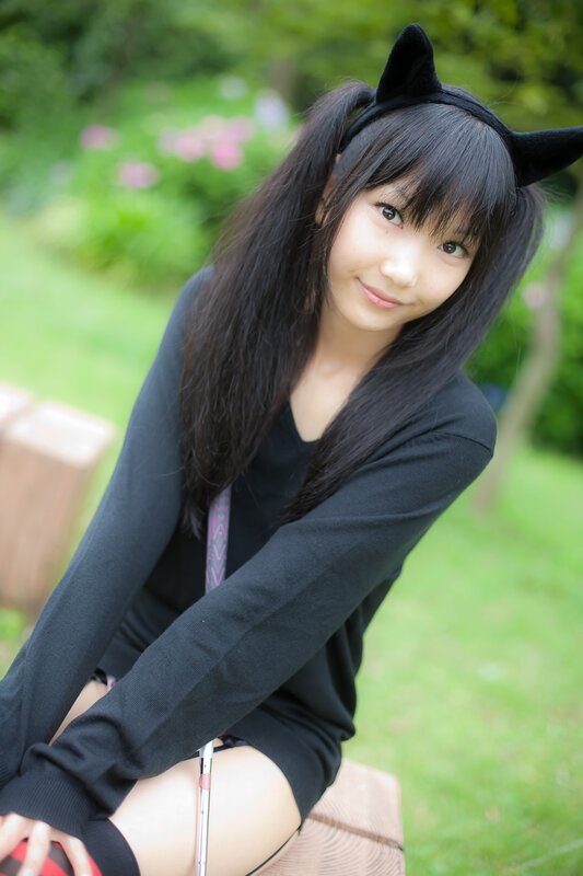 girl with cat ears in garden