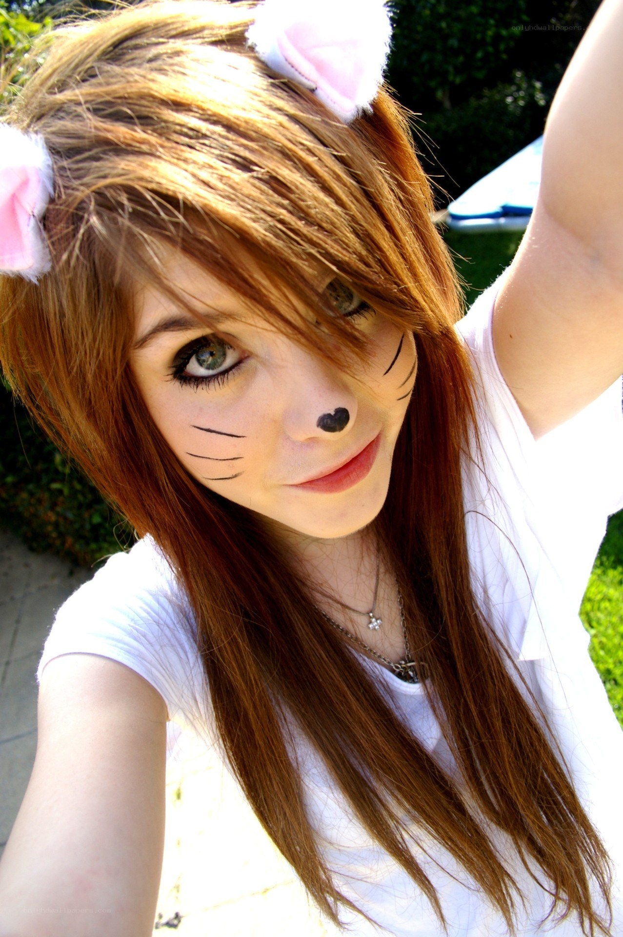 girl with cat makeup and ears