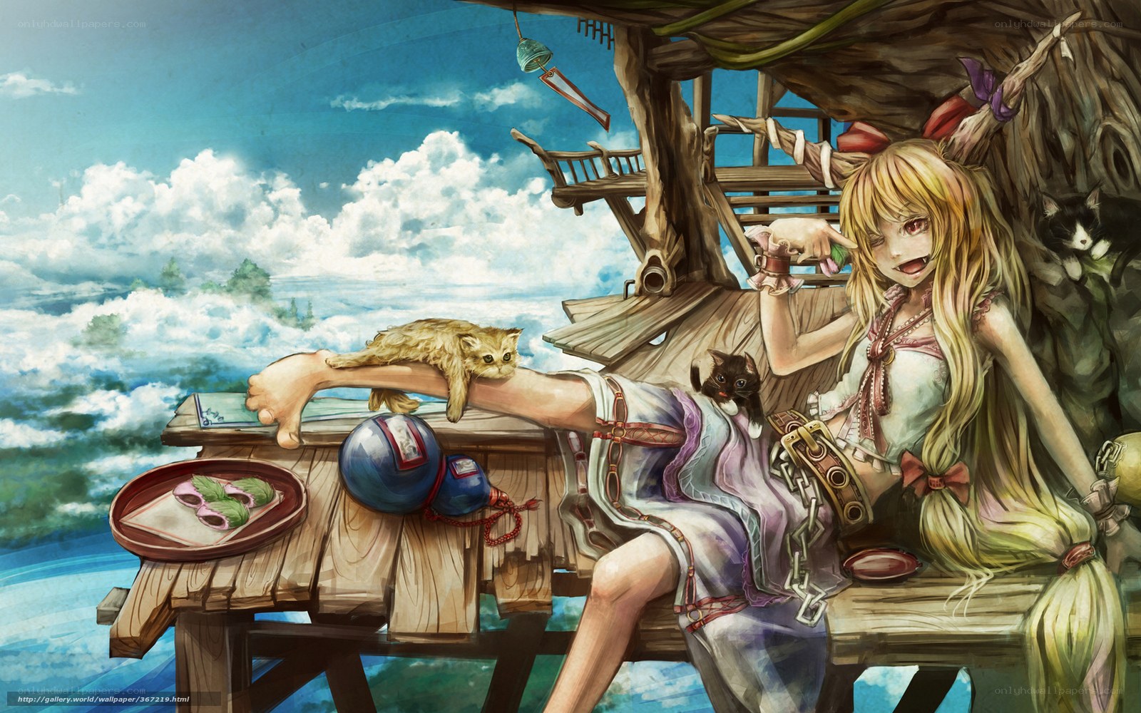 Girl with cats on a treehouse