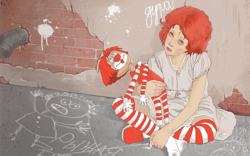 Girl with clown doll in alley