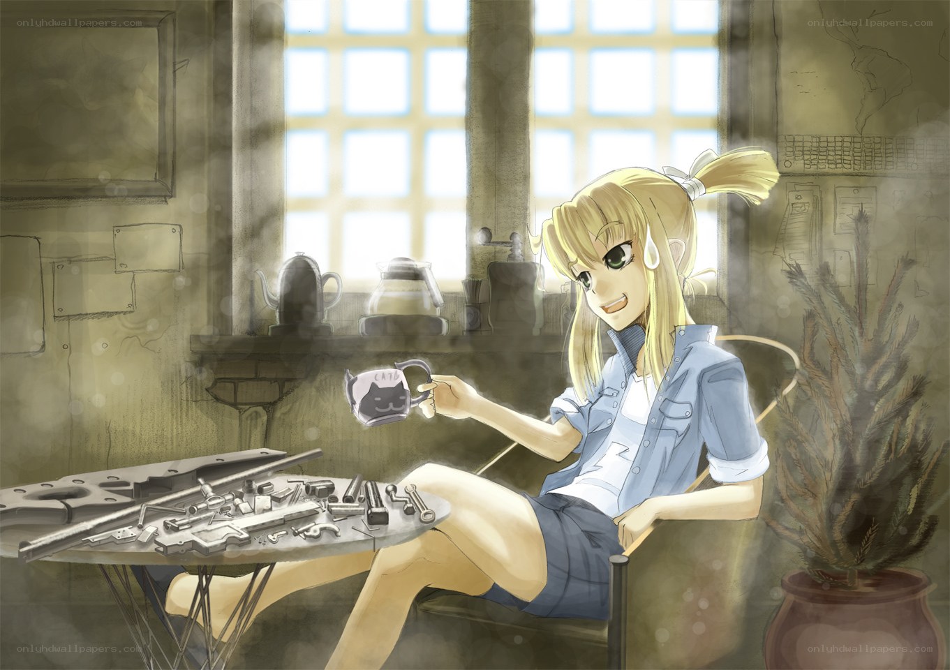 Girl with coffee mug in workshop