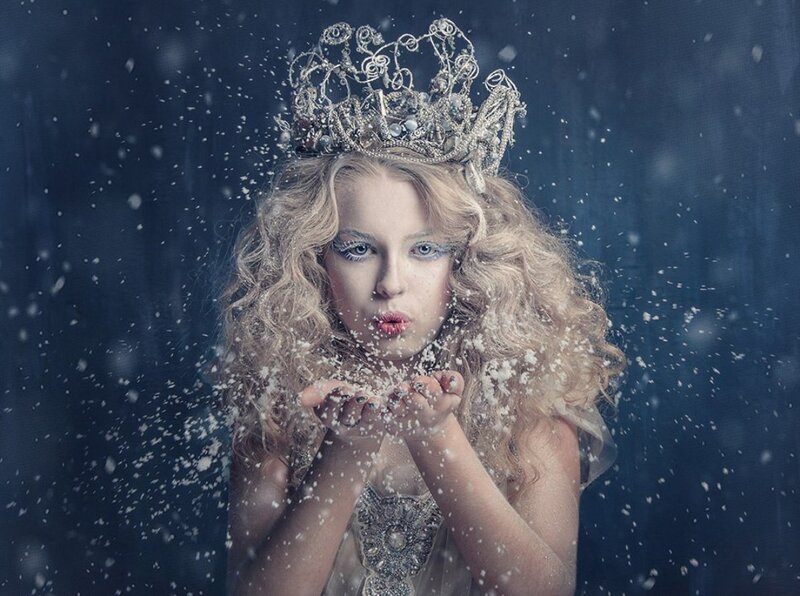 Girl with Crown Blowing Snow