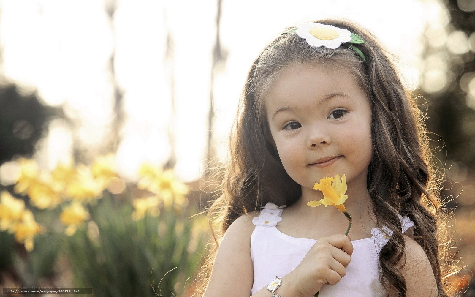 girl with daffodil flower