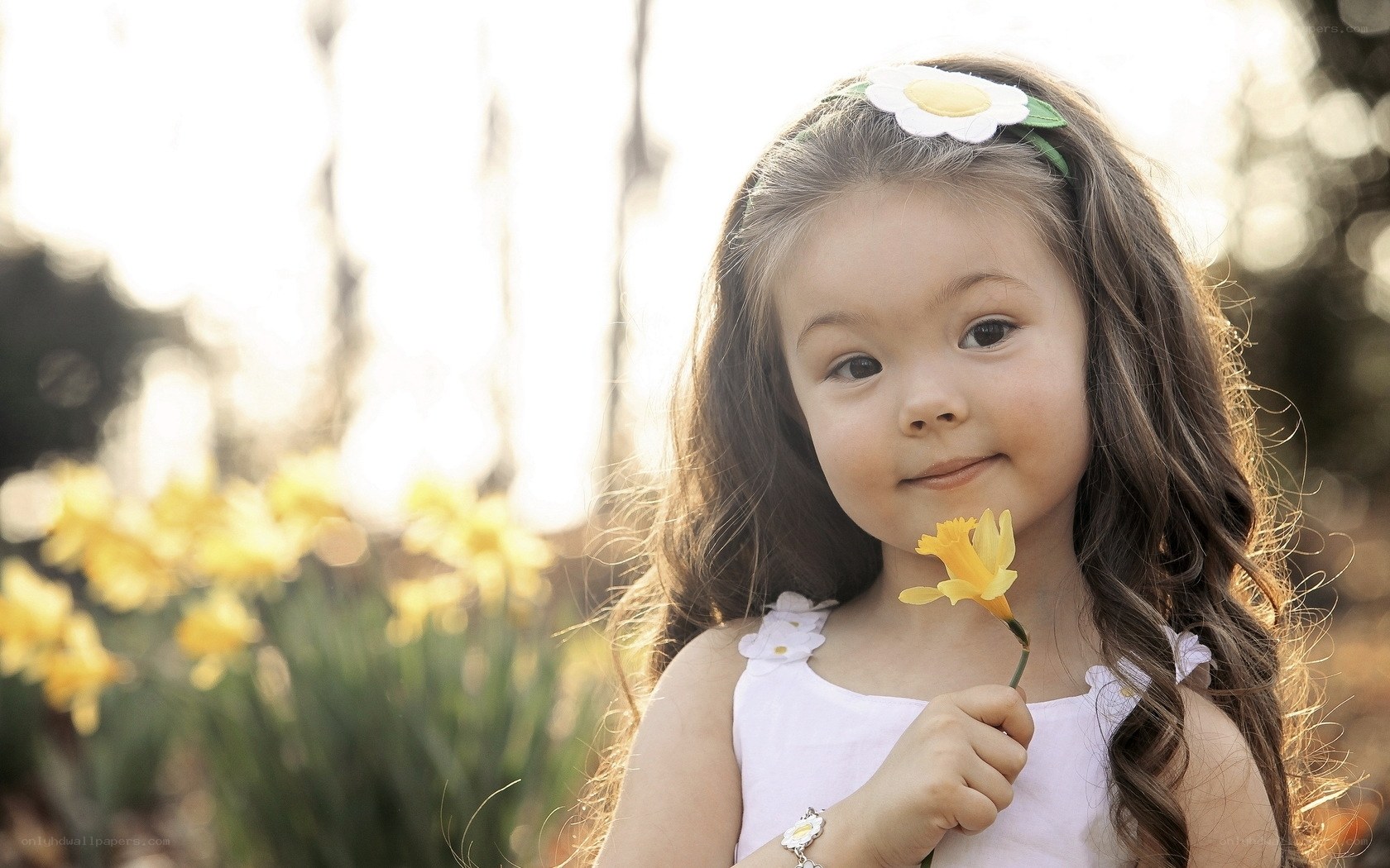 girl with daffodil flower