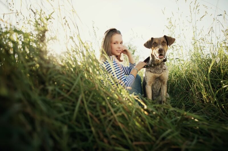 Girl with Dog in Field — Green
