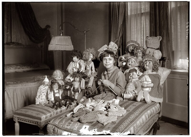 Girl with dolls and knitting