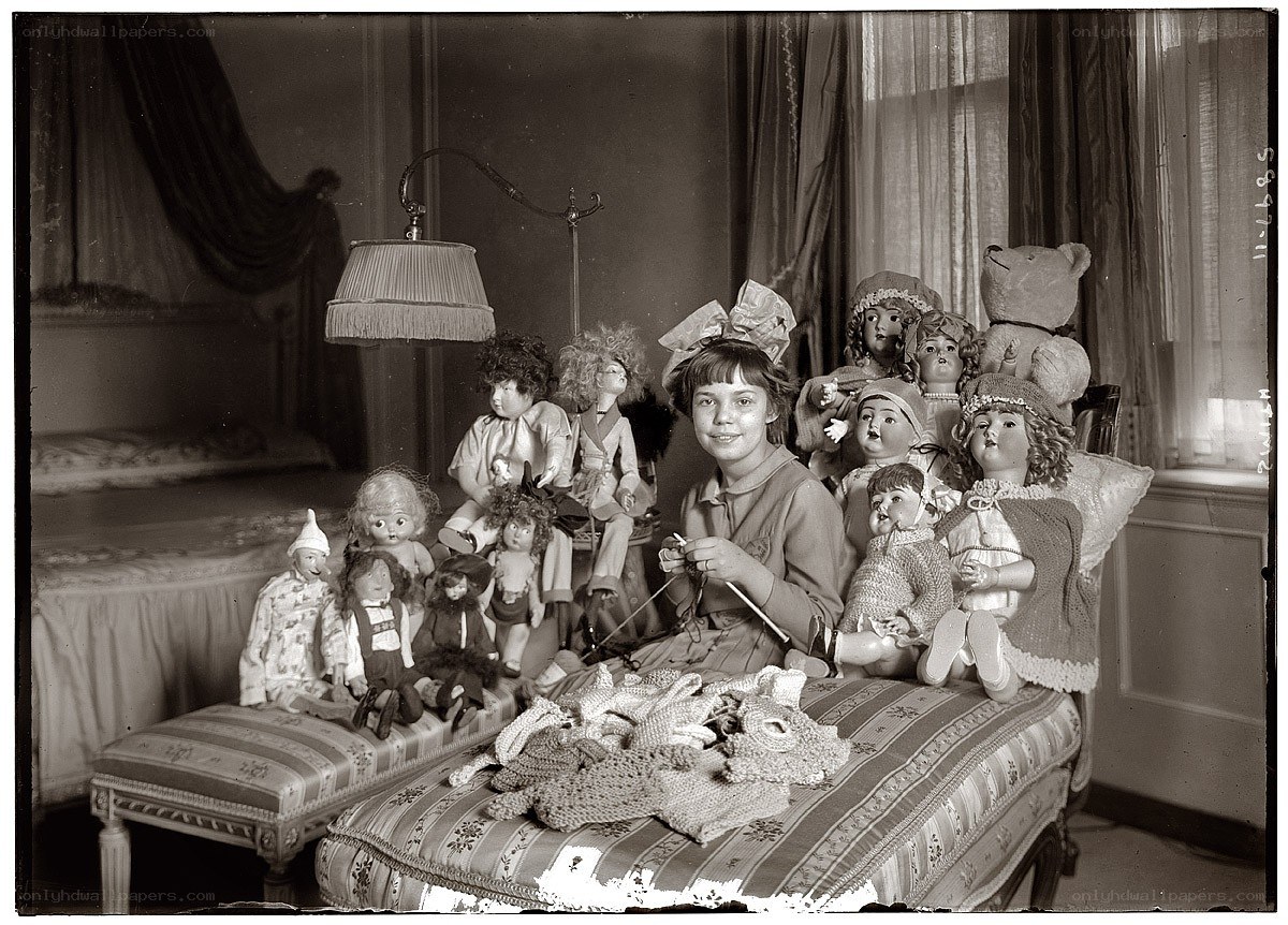 Girl with dolls and knitting