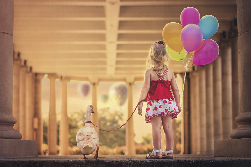 Girl with Duck and Balloons