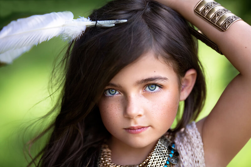 Girl with Feather in Hair