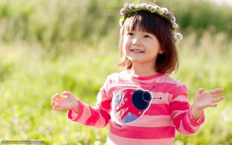 girl with flower crown in field