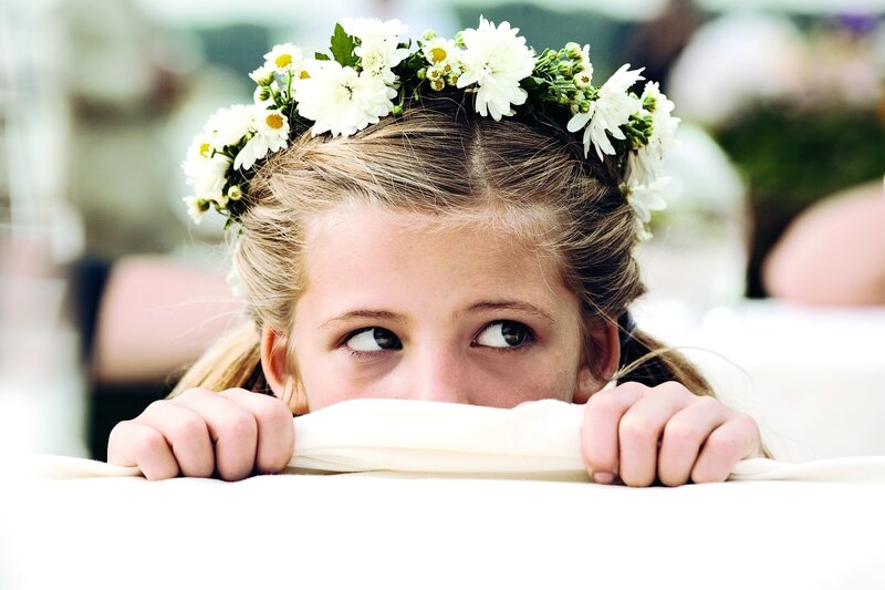 girl with flower crown peeking