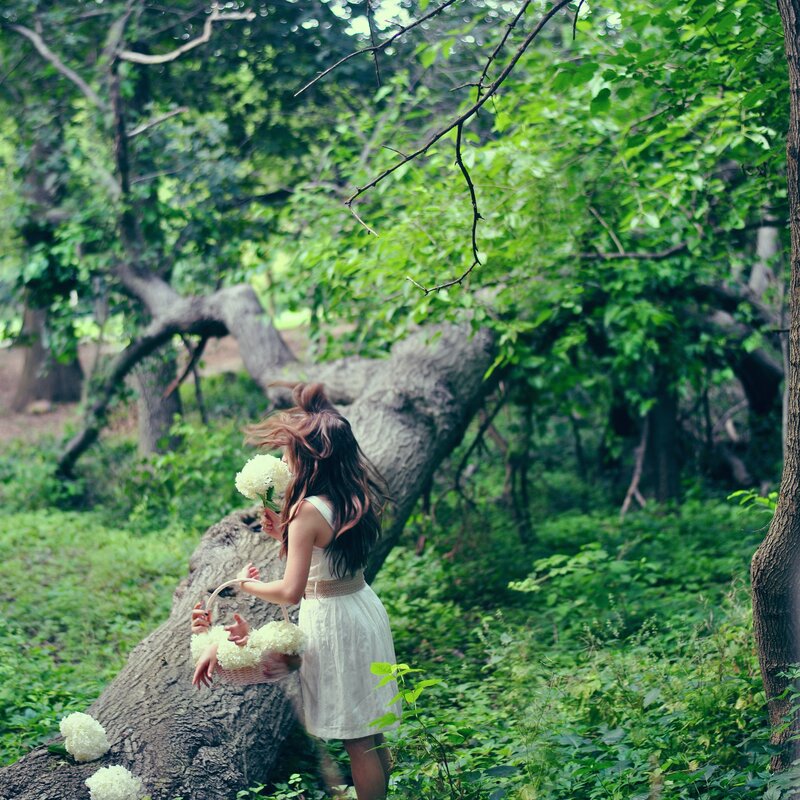 Girl with Flowers in Forest — Green