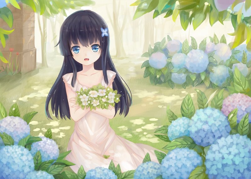 girl with flowers in garden