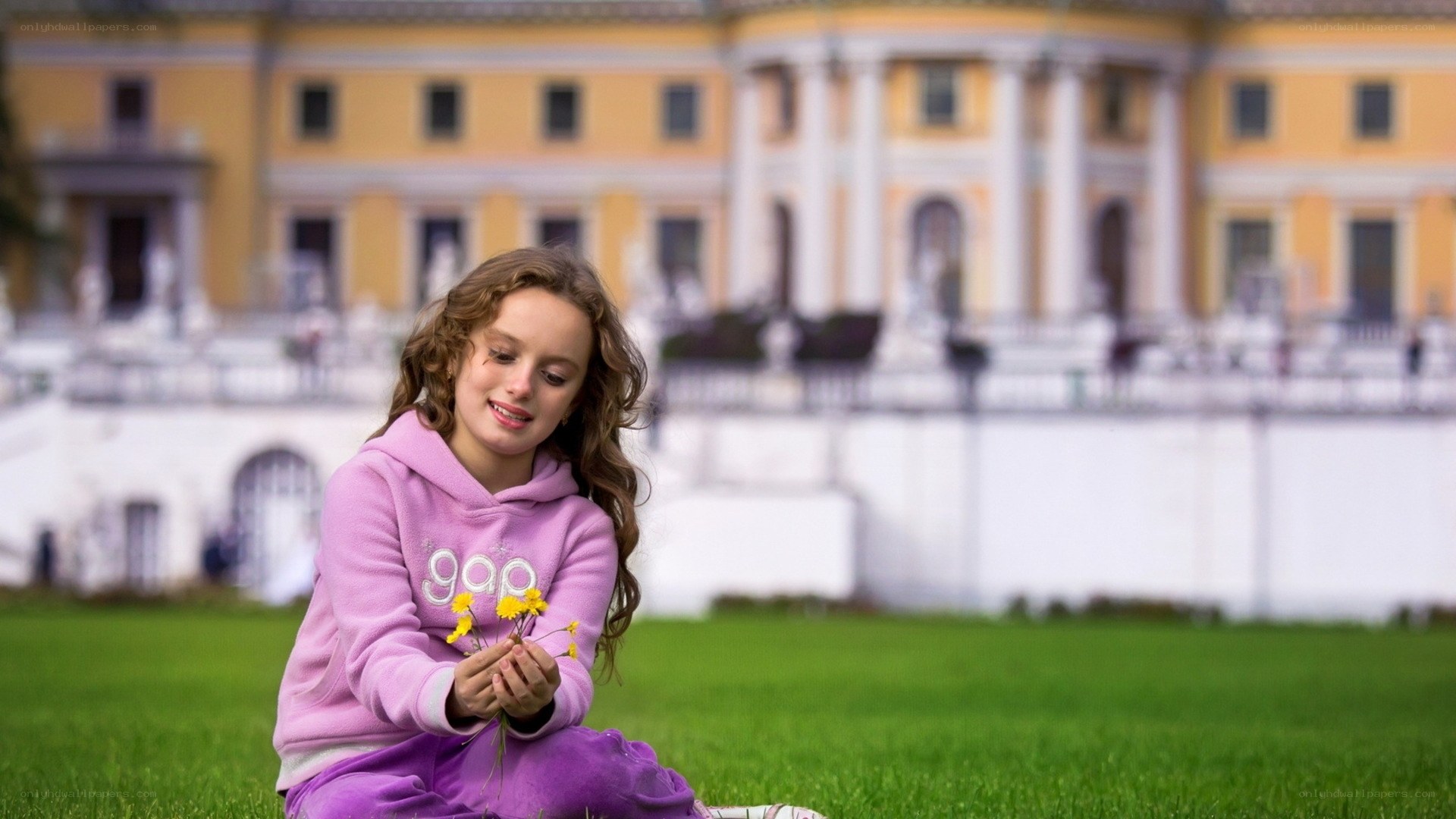 Girl with flowers in park