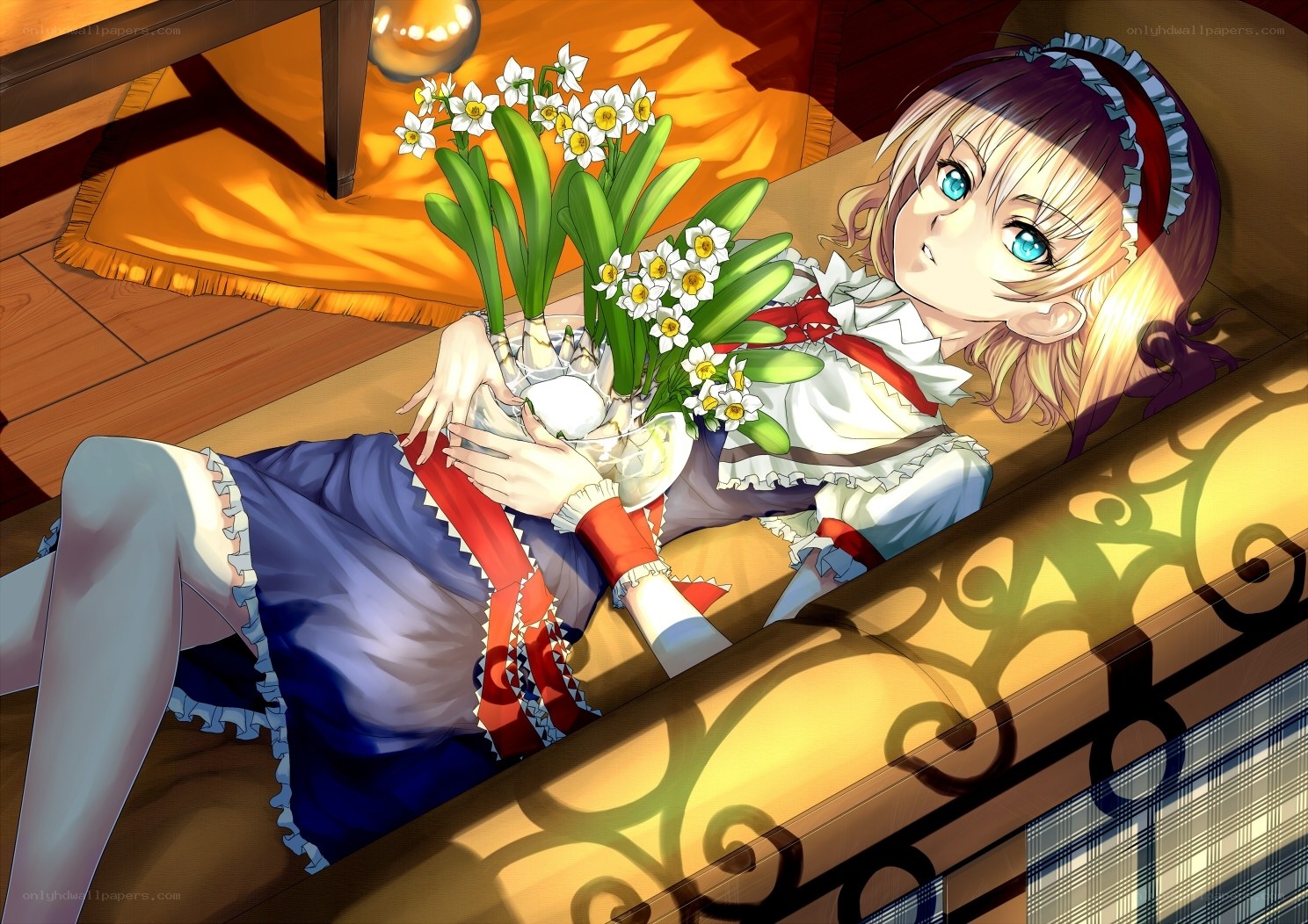 girl with flowers on couch