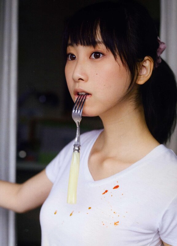 girl with fork in mouth