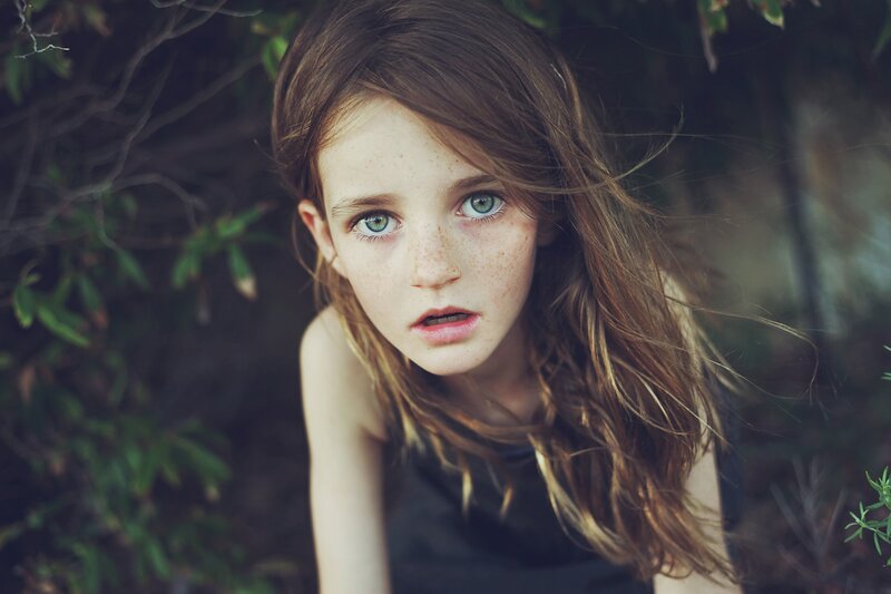 girl with freckles and green eyes